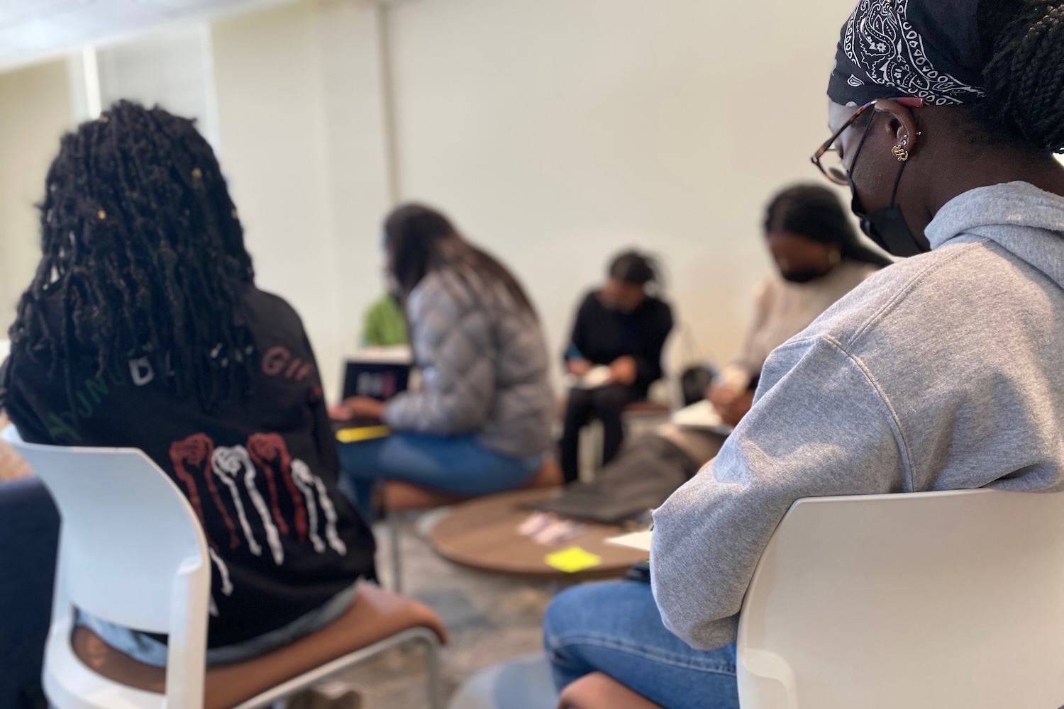 Students working at a Write On, Black Girl retreat