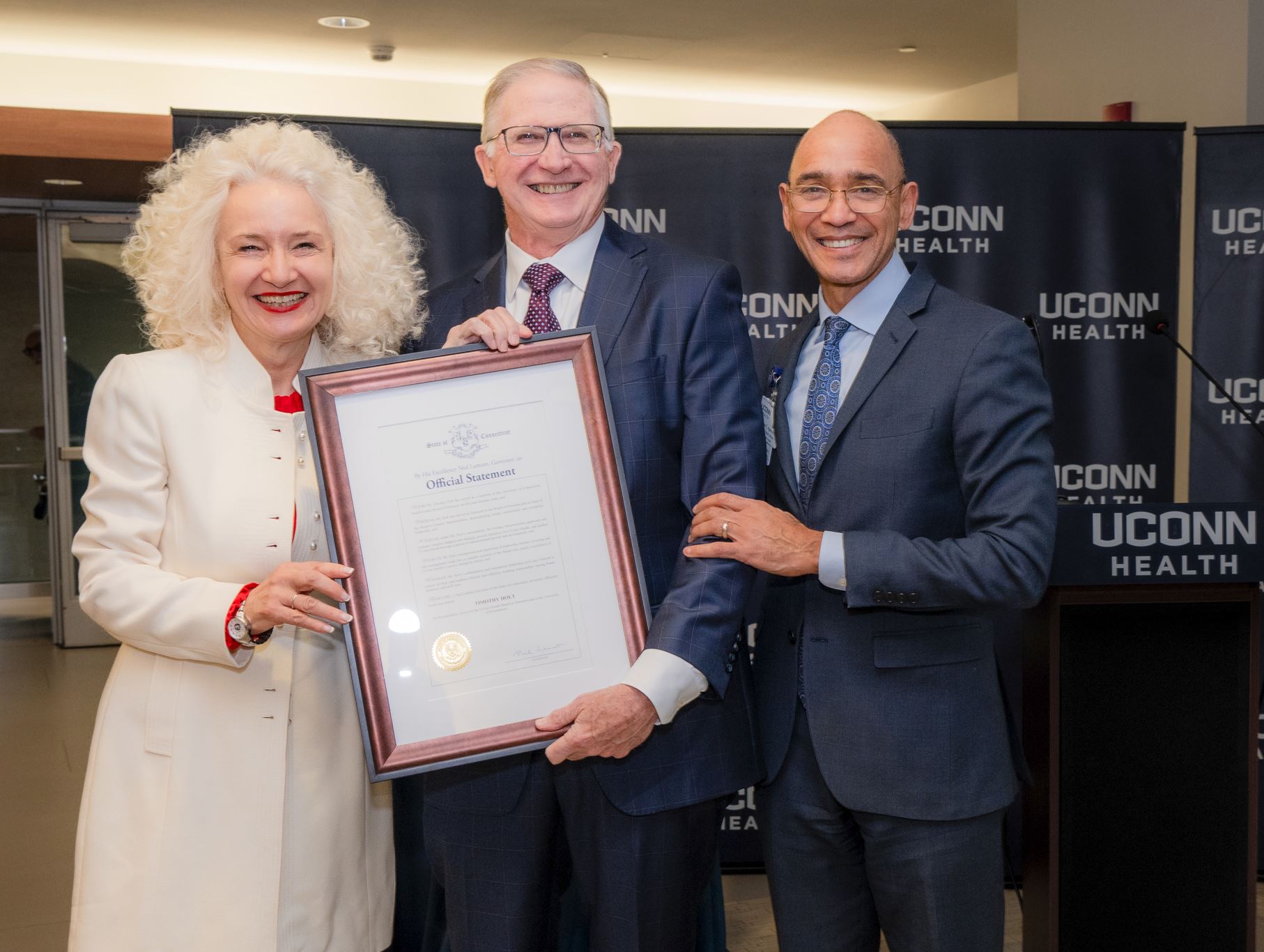 Tim Holt's longtime service to UConn Health's BOD was celebrated by Dr. Radenka Maric and Dr. Andy. Agwunobi.