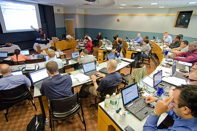 Shikha Sharma, UConn's business librarian, gives a lecture to participants in the Entrepreneurship Bootcamp for Veterans with Disabilities at the School of Business.