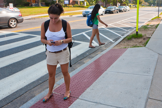 A student uses the mobile map to find a building on campus.