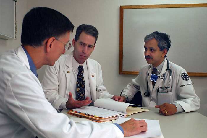 Drs. Robert Dowsett, Jeffrey Spiro and Upendra Hegde. Hegde has received support from Richard and Jane Lublin for his cancer research. (Janine Gelineau/UConn Health Center Photo)