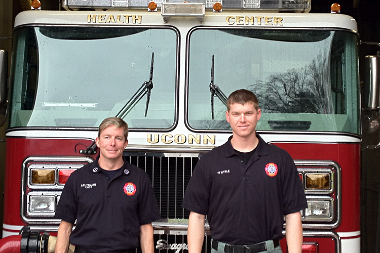 UConn Fire Lt. Wendell Cote (left) and firefighter Brian Little, paramedics based out of the Health Center, transmitted electrocardiogram data from the patient’s home.