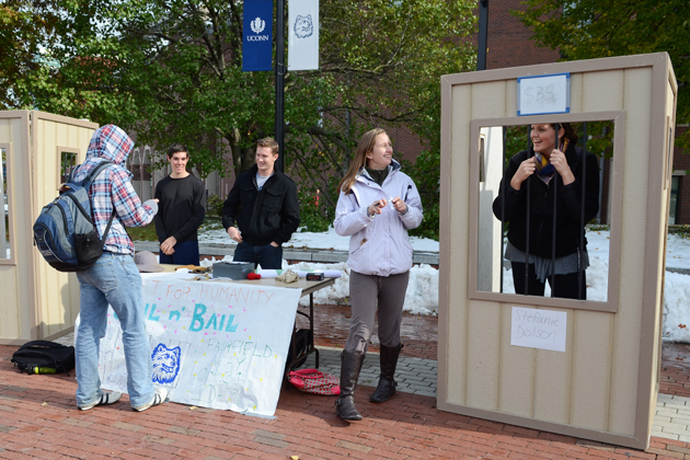 Habitat for Humanity holds their Jail n' Bail event on Fairfield Way where UConn celebrities such as basketball player Stephanie Dolson '14 are held in jail until students donate money to raise or lower their bail on Oct. 31, 2011. (Ariel Dowski/UConn Photo)