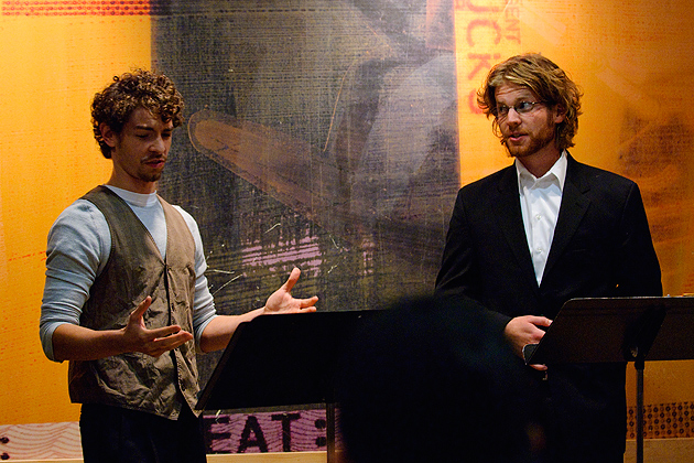 From left: Dan Seigerman and Zak Kamin, senior BFA acting majors, performs as Darwin and FitzRoy (respectively) from the play "After Darwin" during the Charles Darwin: The Man Behind the Idea event at Starbucks Cafe on 195.