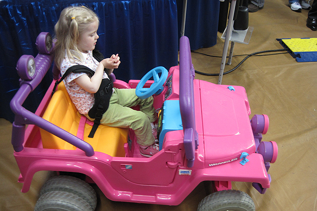 Samantha Gillard enjoying the Ride-On Remote Controlled Car.