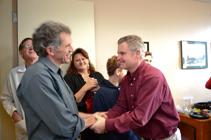 Heart attack survivor John Klimczak (right) credits Dr. Mike Azrin (left) and other UConn Health Center caregivers with saving his life. (Tina Encarnacion/UConn Health Center Photo)