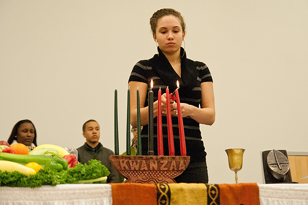 The candle lighting ceremony commences in the Student Union on Dec. 9, 2011. (Max Sinton for UConn)