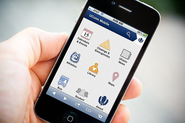 Photo of an iPhone displaying m.uconn.edu.