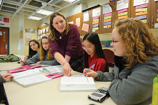 Rachel Buck '01 (ED), '02 MA teaches at the Connecticut International Baccalaureate Academy in East Hartford on Jan. 20, 2012. (Peter Morenus/UConn Photo)