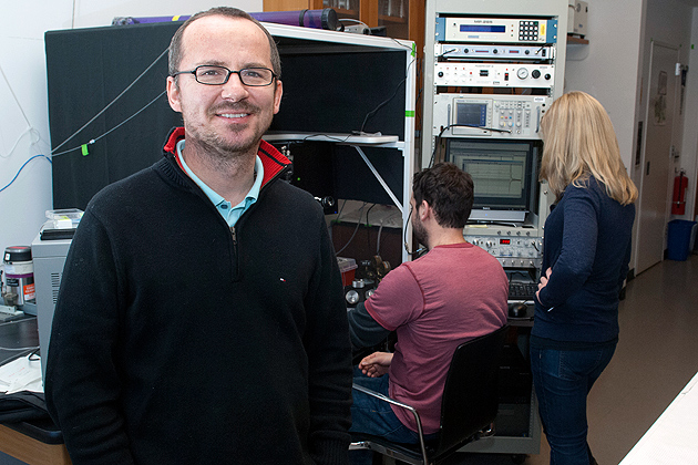 Daniel Mulkey in his lab with graduate students Ian C. Wenker and Joanna Hawryluk. (Daniel Buttrey/UConn Photo)