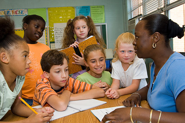 Teacher giving a lesson in the classroom.