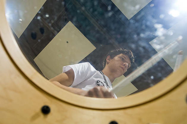 Chris Cerpa of Rocky Hill is seen through the skin of his drum during the Yamaha Sounds of Summer held at the Music Building on June 26, 2012. (Peter Morenus/UConn Photo)