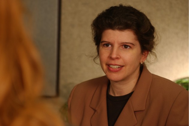 Jennifer Stroop, certified genetic counselor, at UConn Health with a patient. (UConn Health Photo)