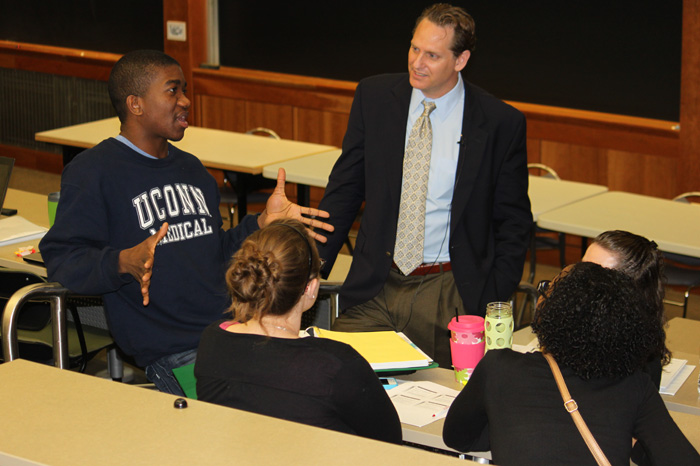 Dr. Scott Ellner speaks to second-year medical students in Massey Auditorium, part of the medical school's new patient safety curriculum, on August 30, 2012. (Sarah Turker/UConn Health Center Photo)