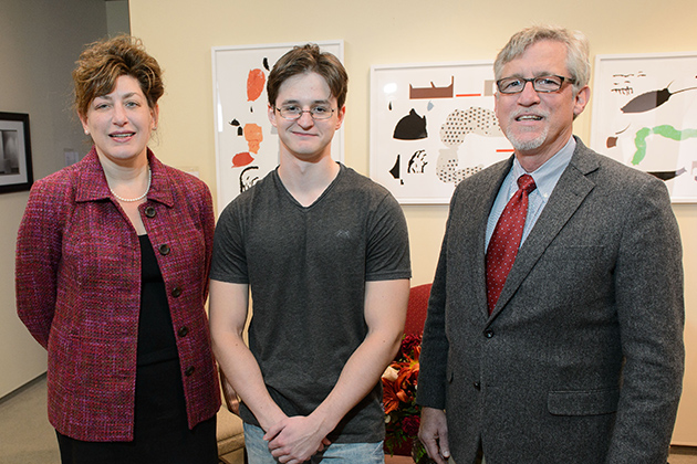 President Susan Herbst, with Alan Polozov '16 (CLAS) and Douglas Hughes at the President's office in Gulley Hall on Oct. 22, 2012. (Peter Morenus/UConn Photo)