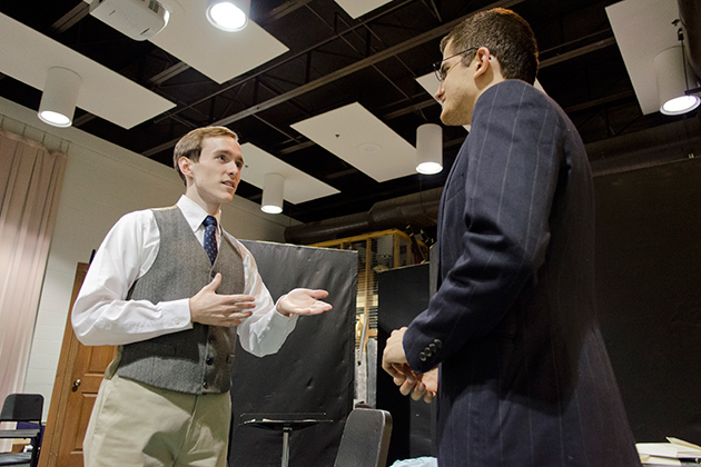 Spencer Reese '13 (SFA), left, gives direction to Ryan Parseghian '14 (SFA) during a dress rehearsal for his opera on Dec. 1, 2012. (Ariel Dowski/UConn Photo)