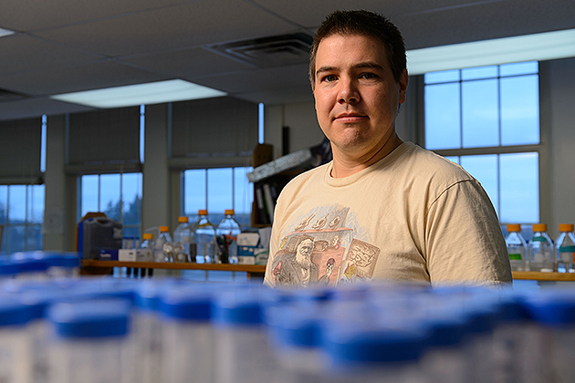 Andrew Pask, associate professor of Molecular & Cell Biology working in his lab. (Peter Morenus/UConn Photo)