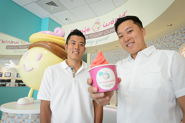 Brothers Willam Bok '08 (CLAS), left, and William Bok '04 (BUS), owners of Froyo World at Storrs Center on July 23, 2013. (Peter Morenus/UConn Photo)