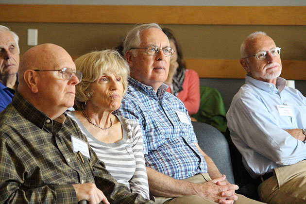 Bud Desmond '55 (CLAS), Gail Desmond, Richard Rice '81 (CLAS), and Philip Houk '74 (CLAS) participate in a talk about how climate change is affecting animals' ranges, including in New England. (Christine Buckley/UConn Photo)