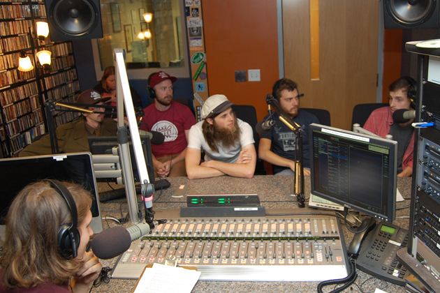 Ryan Caron King ’15 (CLAS), general manager of WHUS, interviewing the folk group Poor Old Shine.(Ken Best/UConn Photo)