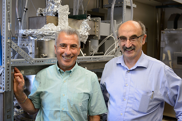 Baki Cetegen, left, head of the Department of Mechanical Engineering and the School of Engineering’s United Technologies Chair, and Eric Jordan, United Technologies Professor of Advanced Materials Processing, at the office of Amastan at the Depot Campus on June 30, 2014. (Peter Morenus/UConn Photo)