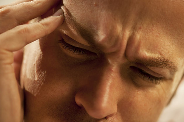 A man experiencing pain. (iStock Photo)