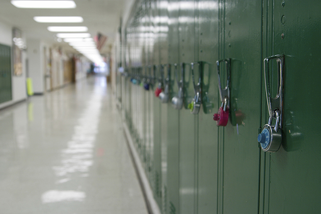 A row of lockers in an empty school hallway. (iStock Photo)