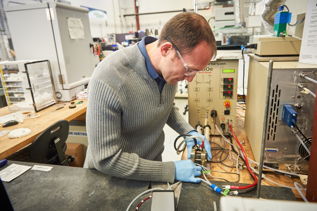 William Mustain, associate professor of chemical and biomolecular engineering, in a lab at C2E2 on Jan. 21, 2016. (Peter Morenus/UConn Photo)