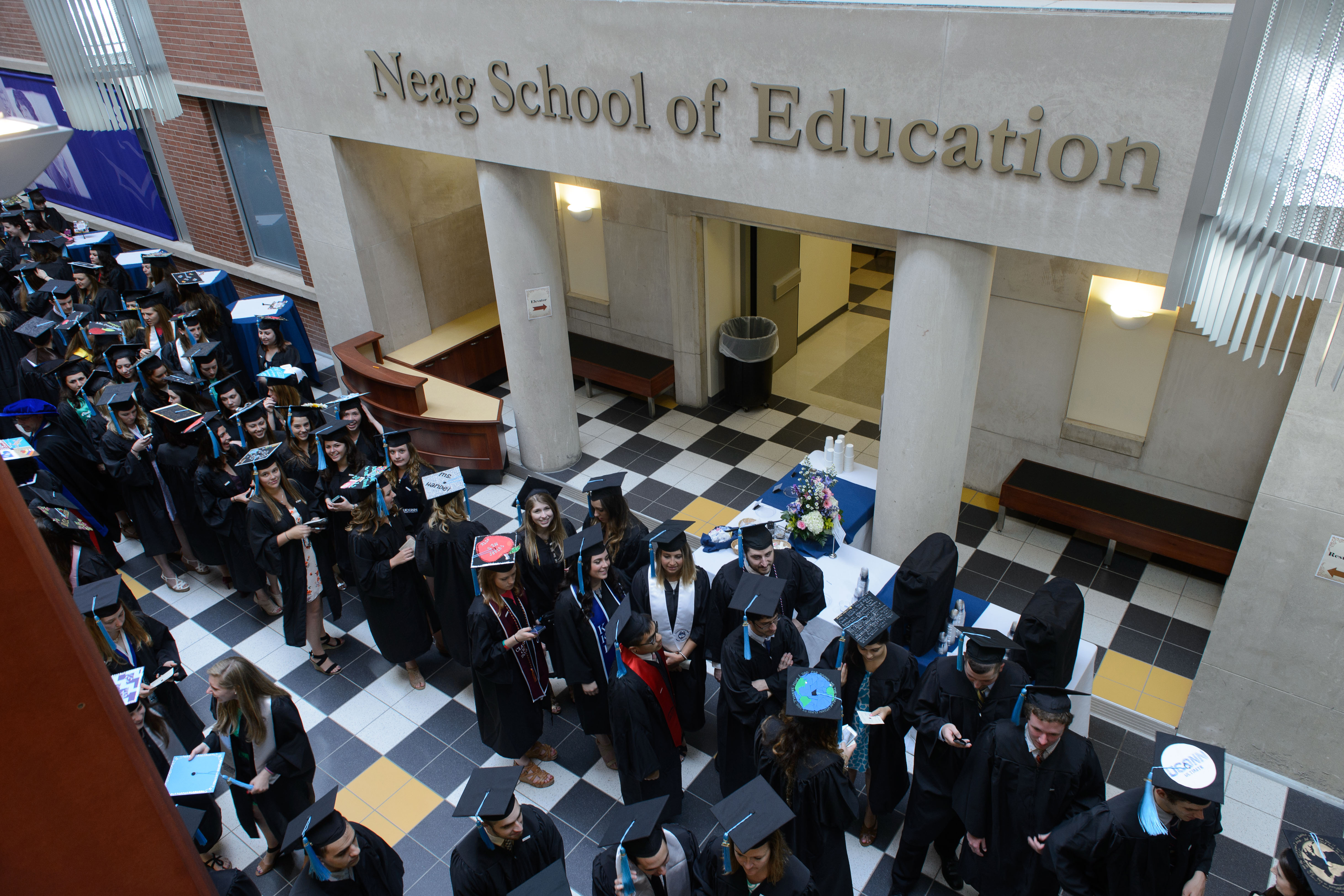 Neag School of Education degree candidates prepare for their Commencement procession at the Gentry Building on May 10, 2015. (Peter Morenus/UConn Photo)