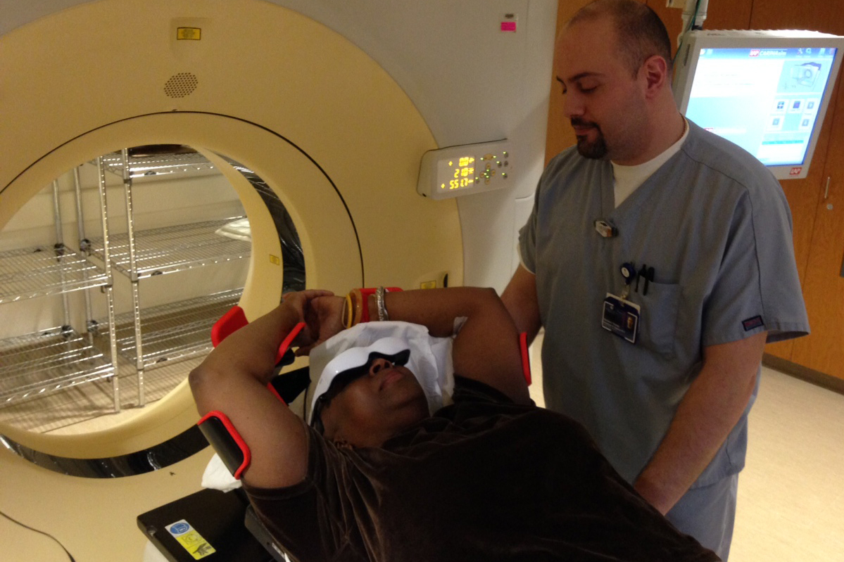 Deep Breath patient Andree Dennis-Gervais in the Simulation Room at UConn Health, undergoes training to use goggles in the CT scanner. She recently finished radiation treatment for cancer at UConn Health recently. (Lauren Woods/UConn Health Photo)