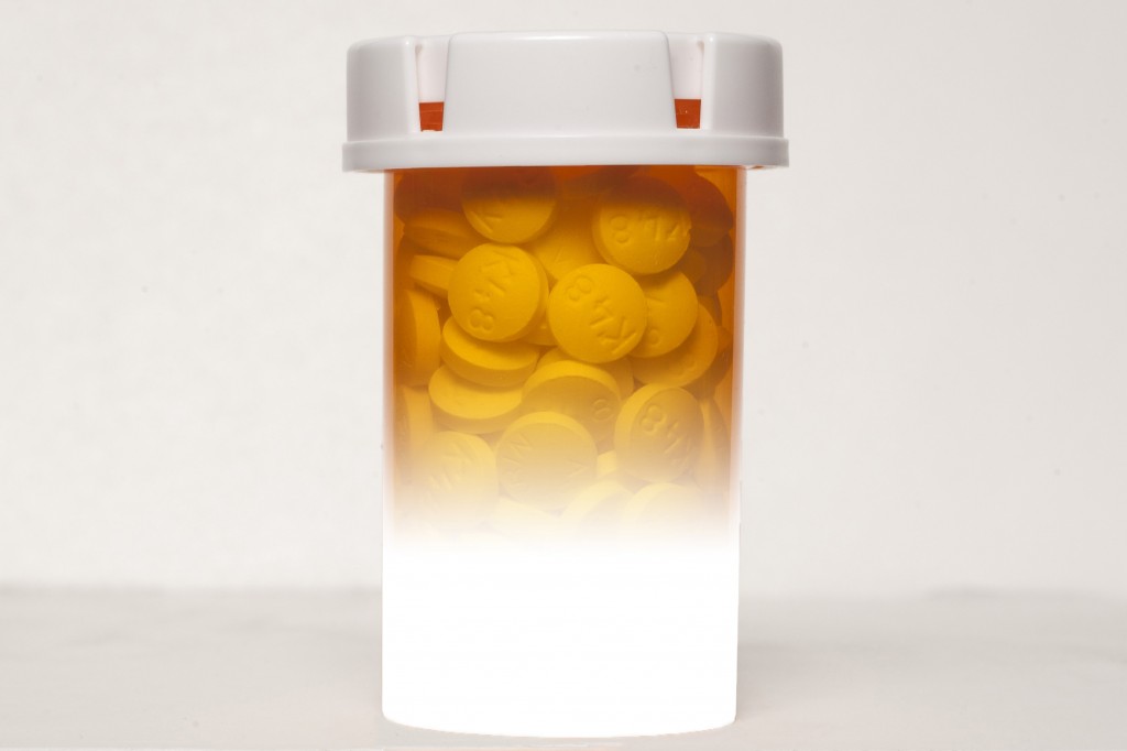 Still life photo of pills and pill bottles. (Sean Flynn/UConn Photo)