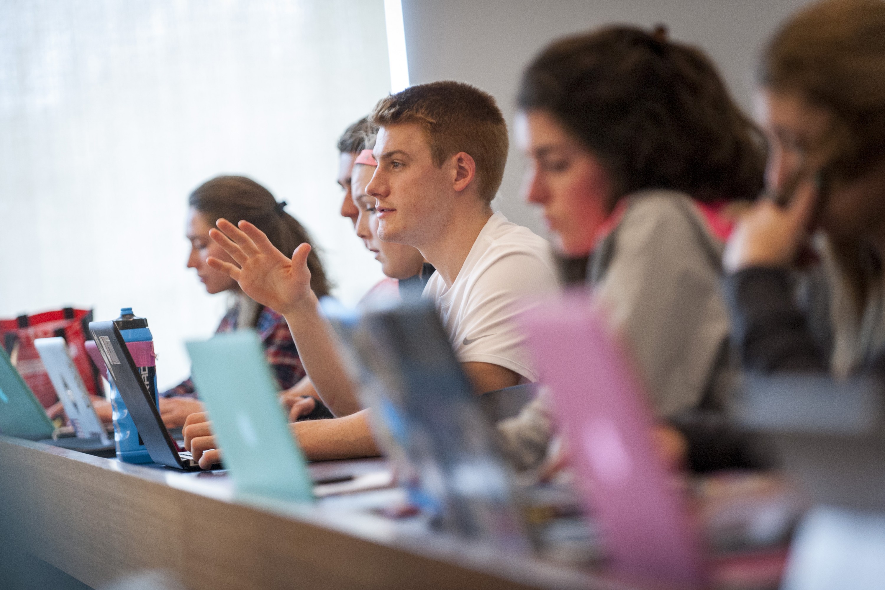 Student-athlete Greg Baliko (Men’s Swimming) in class on March 8, 2016. (Sean Flynn/UConn Photo)