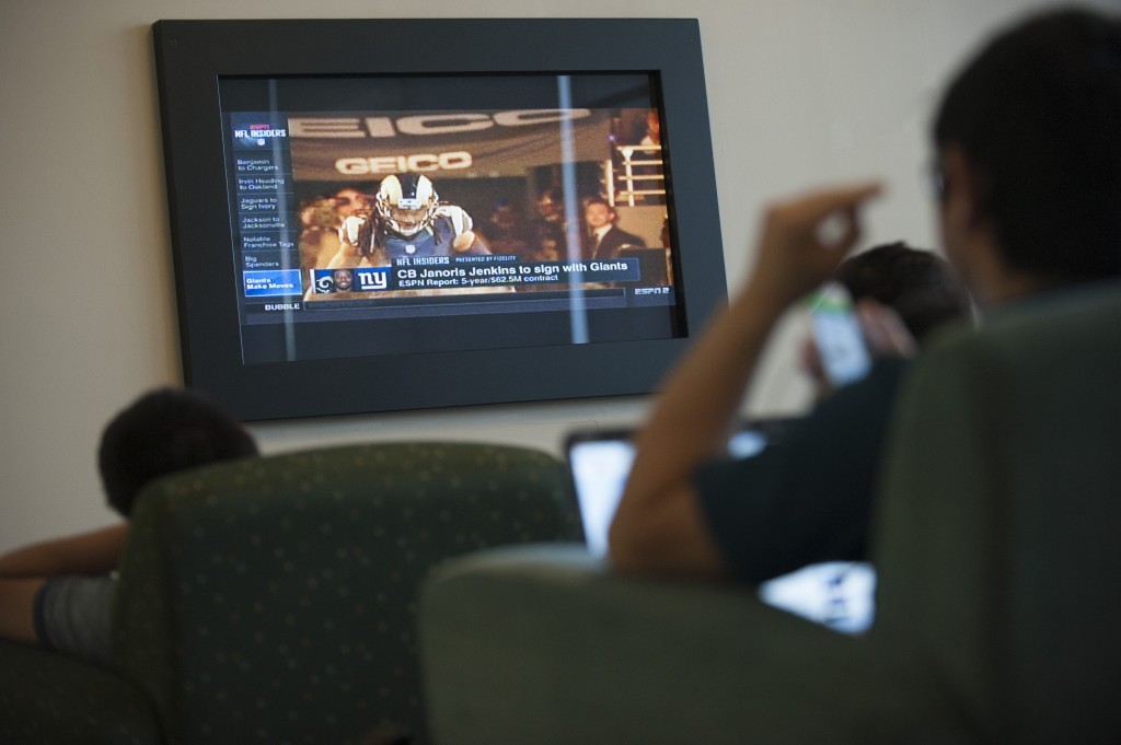 Watching television (TV) at the Student Union on March 9, 2016. (Sean Flynn/UConn Photo)