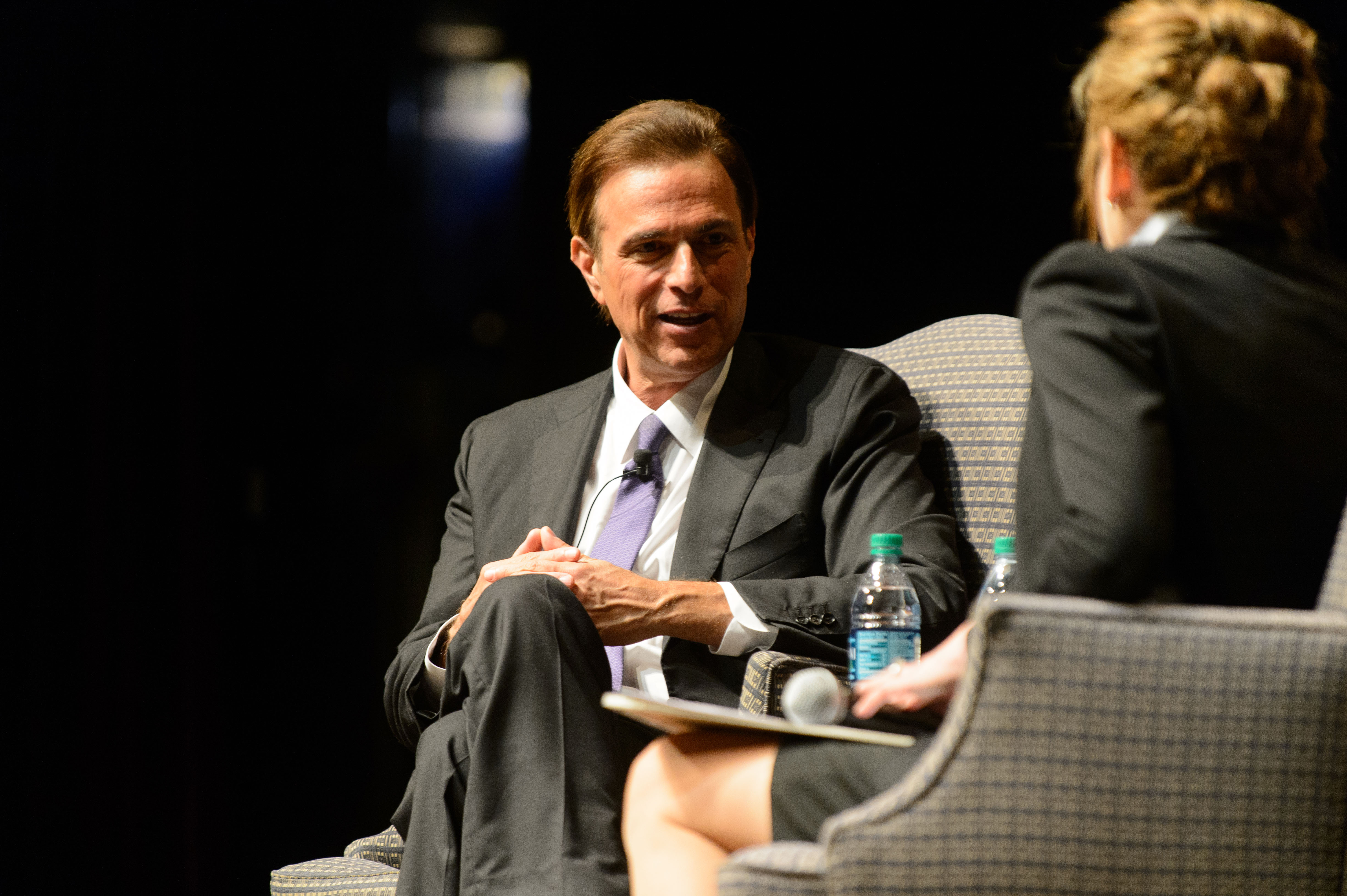 Historian Michael Beschloss, left, and President Susan Herbst speak during the Edmund Fusco Contemporary Issues Forum held at the Jorgensen Center for the Performing Arts on April 13, 2016. (Peter Morenus/UConn Photo)