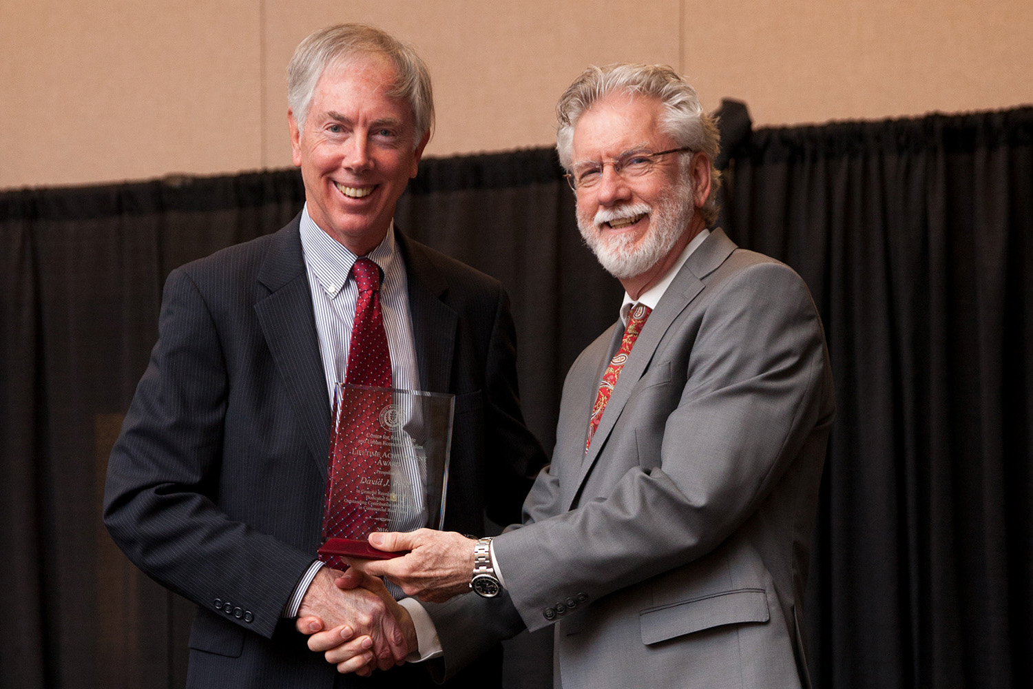 David J. Reilly, retired president and CEO of Cornerstone Real Estate Advisors, and John Glascock, director of the UConn Center for Real Estate and Urban Economic Studies. (Zack Wussow/UConn photo)