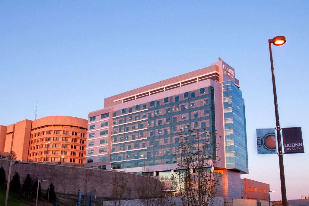 The original patient tower, left, and the new tower that together make up UConn John Dempsey Hospital. (Janine Gelineau/UConn Health Photo)