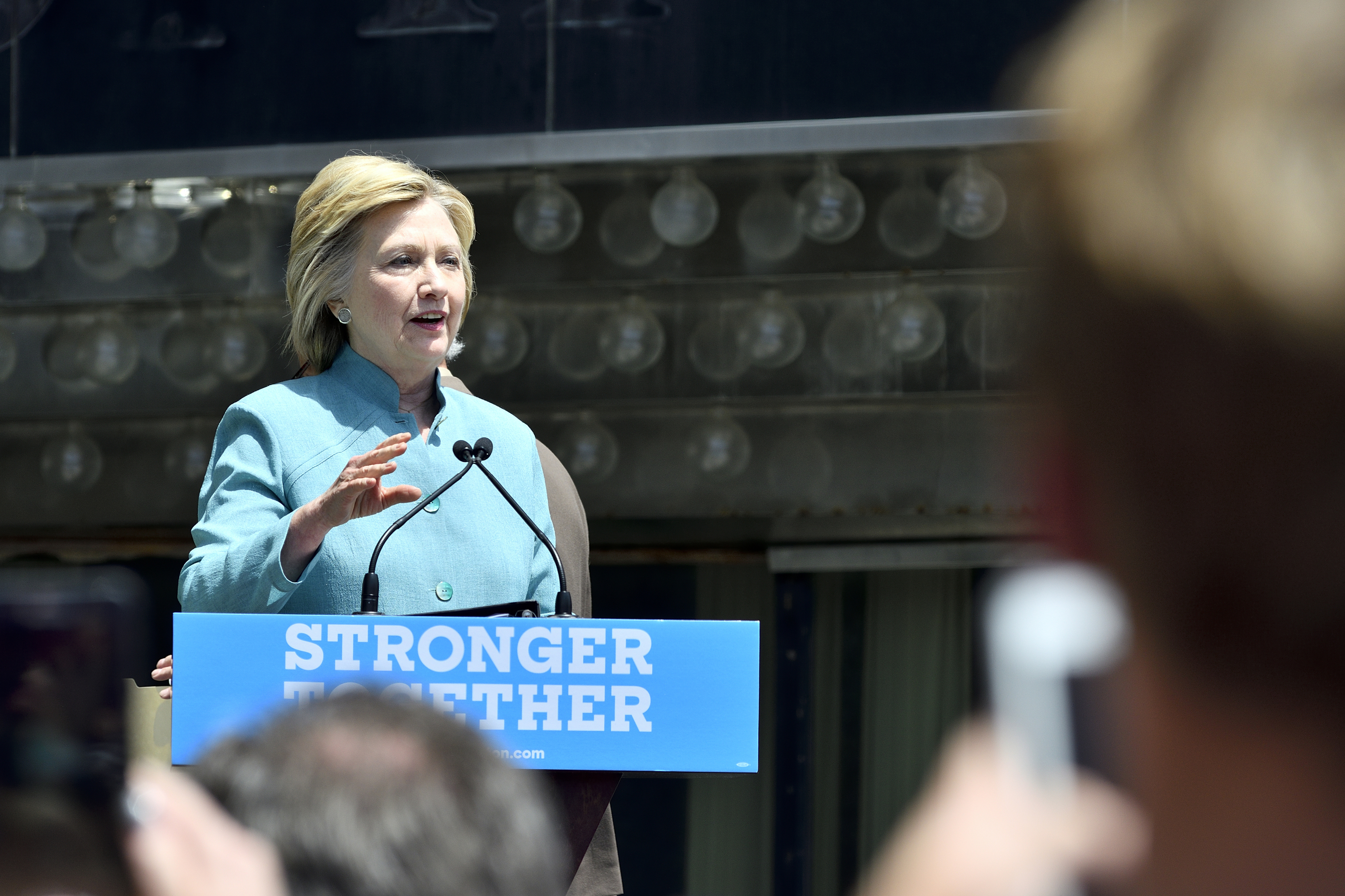 Hillary Clinton attends a rally on July 6 in Atlantic City, N.J., where she speaks to supporters as she stands directly below the sign of the closed Trump Plaza. (iStock Photo)