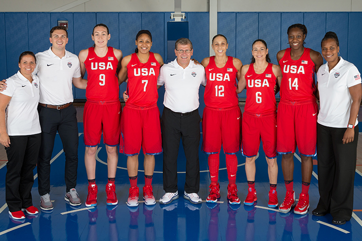 The five former Huskies on the USA Basketball Women's National Team, along with head coach Geno Auriemma and from left, Jen Rizzotti, Kevin DeMille, and Jamelle Elliott. (Photo: Nathaniel S. Butler/NBAE/Getty Images)e 2016 USA Basketball Women’s National Team, at the Madison Square Garden training facility in New York on July 30, 2016. (Photo: Nathaniel S. Butler/NBAE/Getty Images)