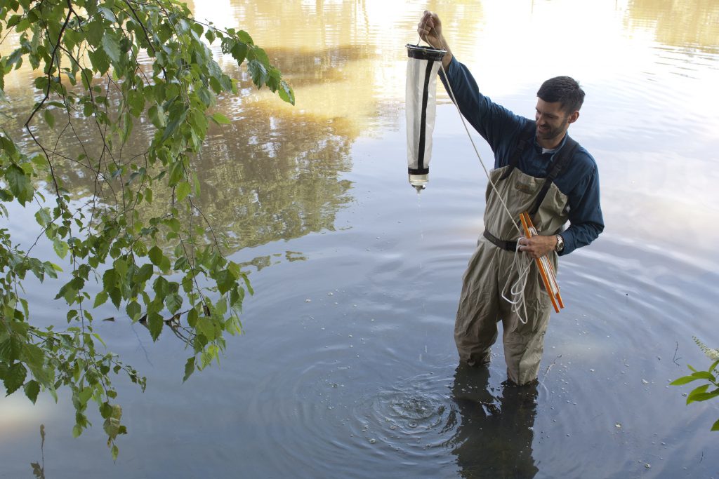 UConn ecologist Mark Urban headed an international group of biologists calling for a global effort to improve climate change predictions for biodiversity. (Daniel Buttrey/UConn Photo)