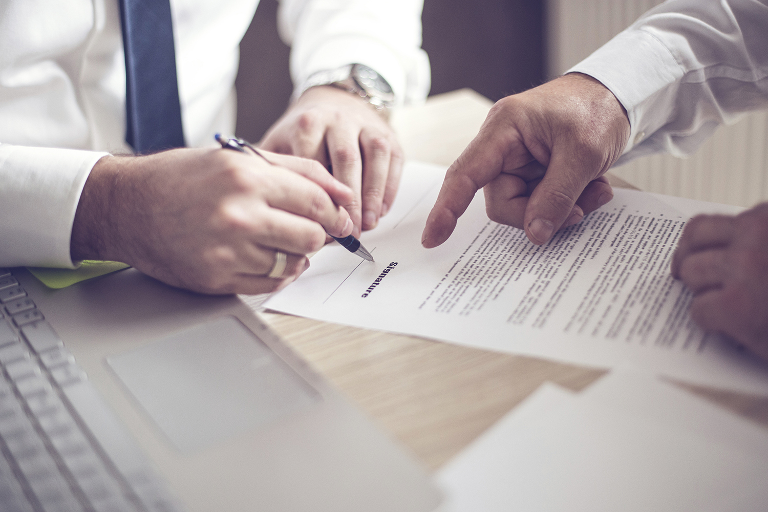 Business man signing a contract