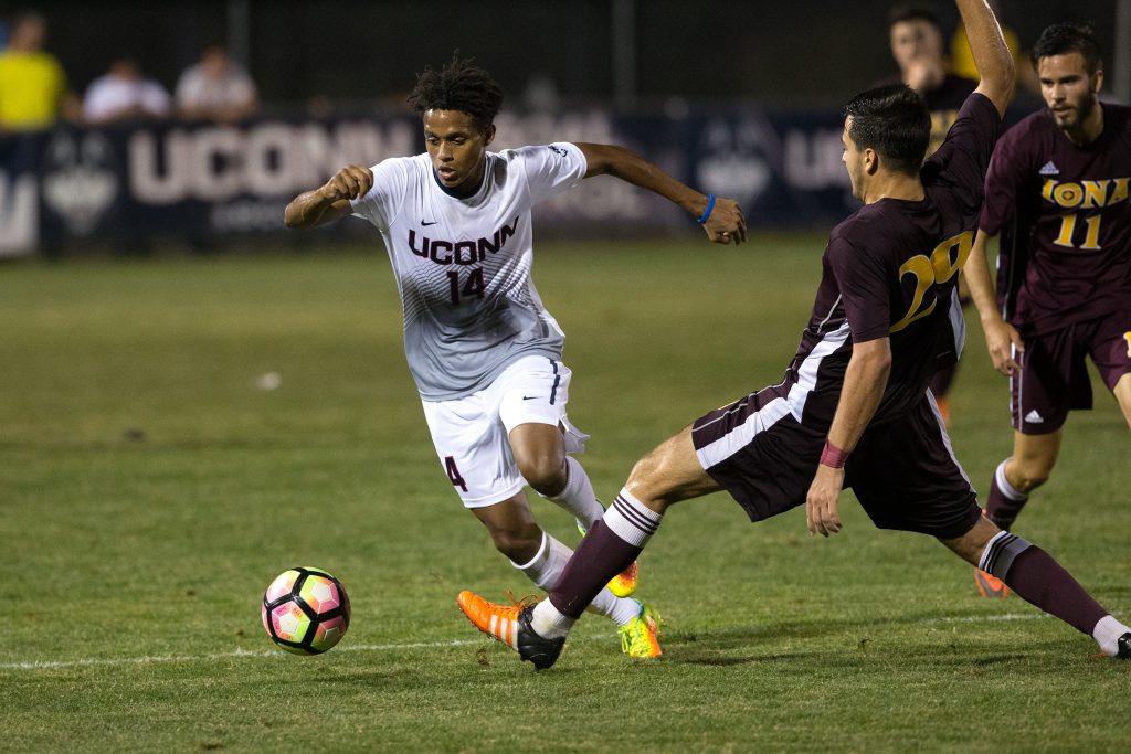 UConn's Munir Saleh #14 is one of the six Huskies named to all-conference teams. (Stephen Slade '89 (SFA) for UConn)