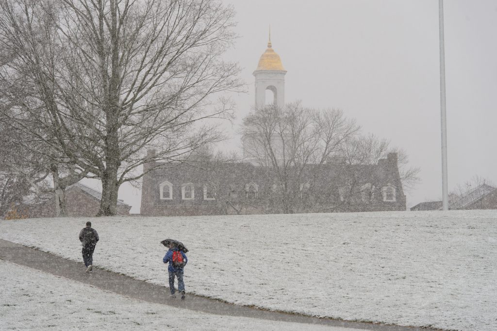 A snowy view of the Great Lawn toward looking toward the Wilbur Cross Building. (Peter Morenus/UConn File Photo)