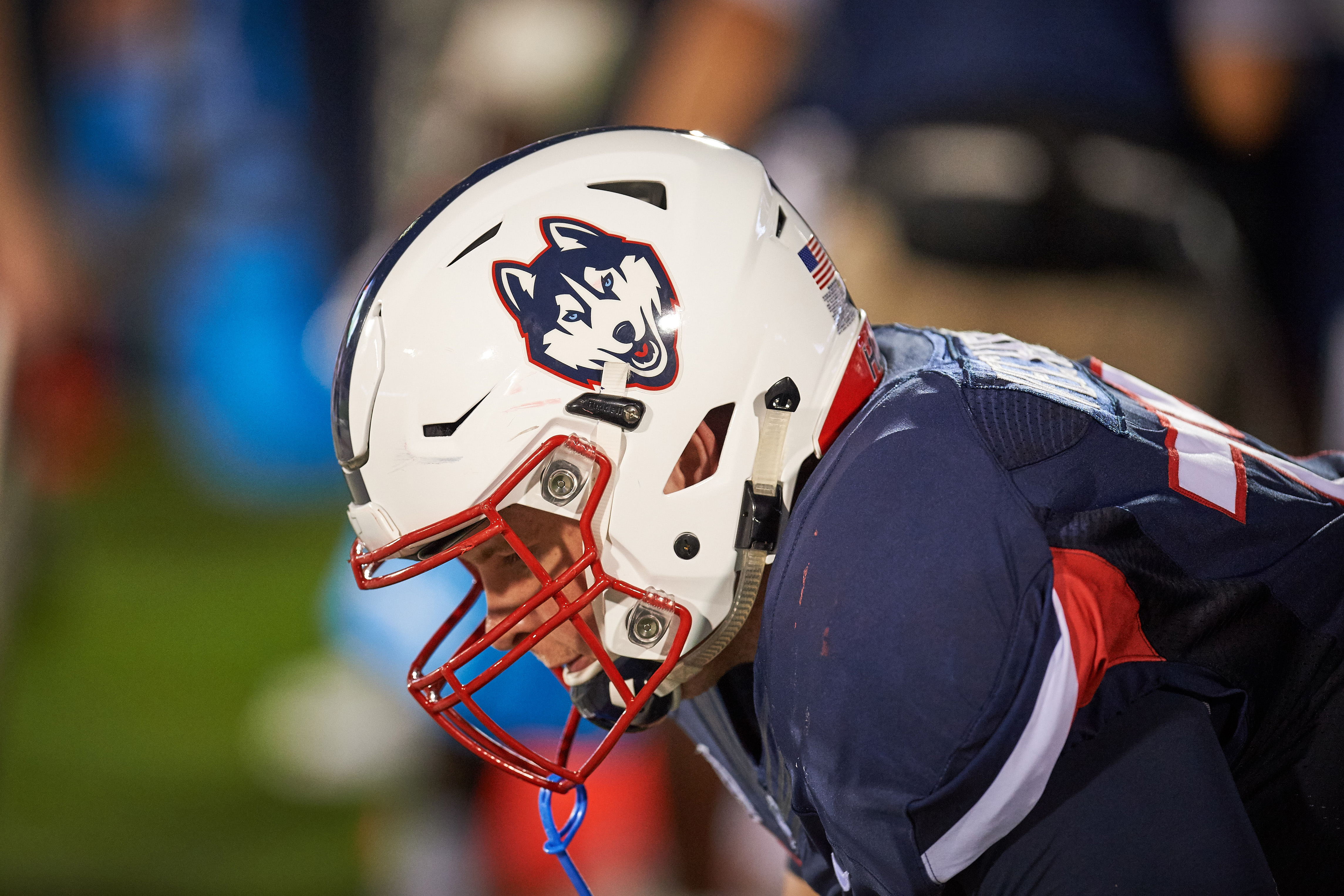 UConn football player in Husky uniform. (Peter Morenus/UConn Photo)