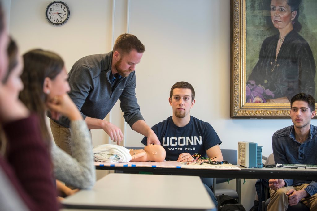 Teams of students from the Schools of Nursing and Engineering collaborated on a concept they dubbed the Baby Breathing Bed, designed to prevent babies dying from Sudden Infant Death Syndrome. (Sean Flynn/UConn Photo)