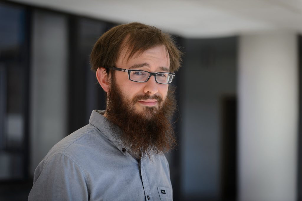 Graduate student Daniel Hoying at the Physics Building. (Peter Morenus/UConn Photo)