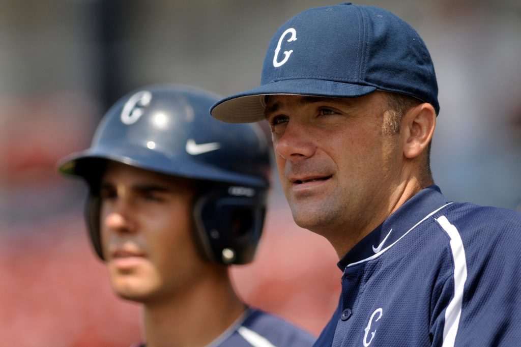 The University of Connecticut baseball head coach Jim Penders (right) watches his team practice at Dodd Stadium Thursday, with player Bill Ferriter (left). UConn meets Oregon in the opening game of the NCAA tournament Friday night, their first tournament appearance in 16 years. CLOE POISSON|cpoisson@courant.com ORG XMIT: 10014879A