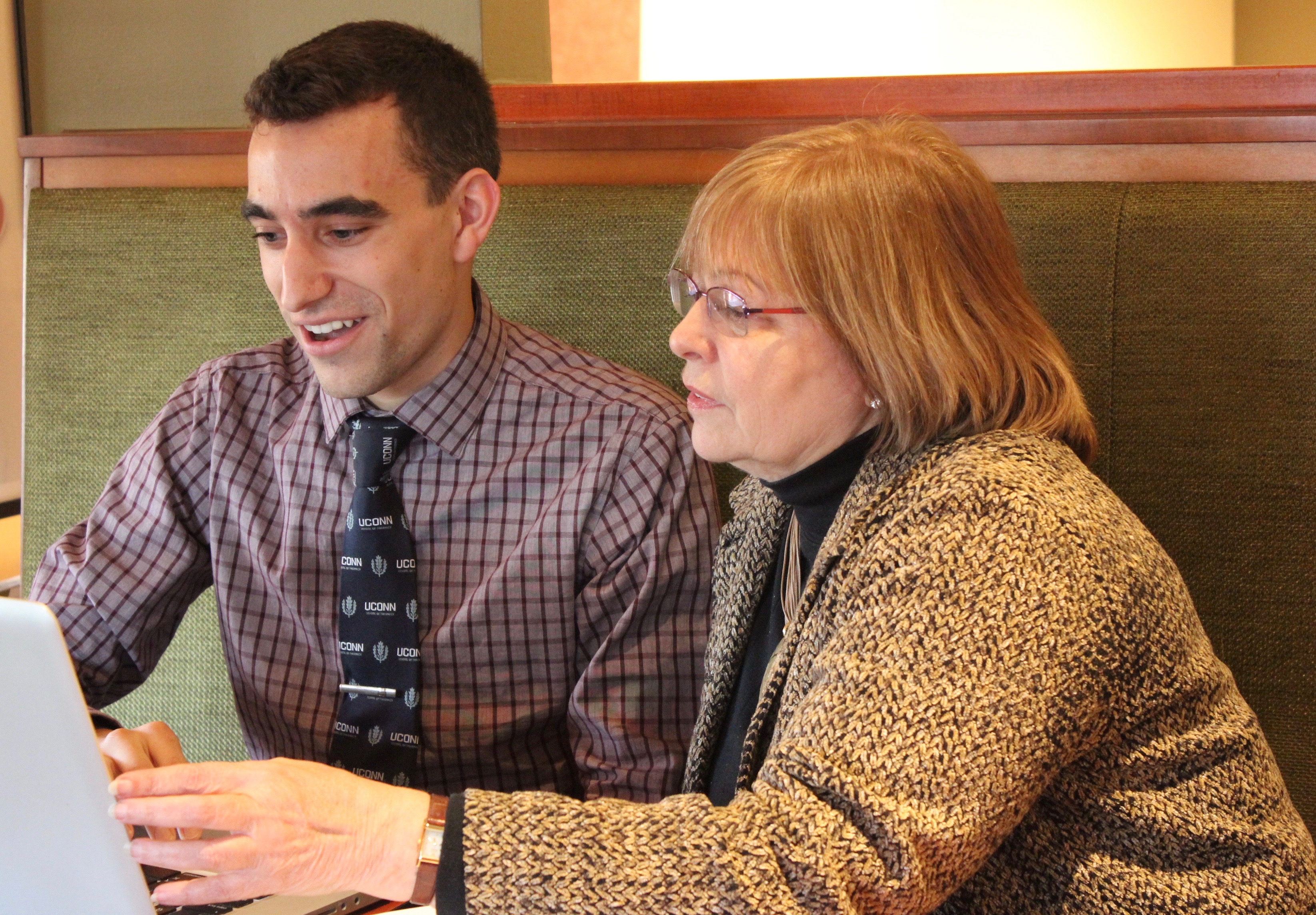 Jason Funaro and Marie Smith, Assistant Dean for Practice and Public Policy Partnerships. (Sheila Foran/UConn Photo)