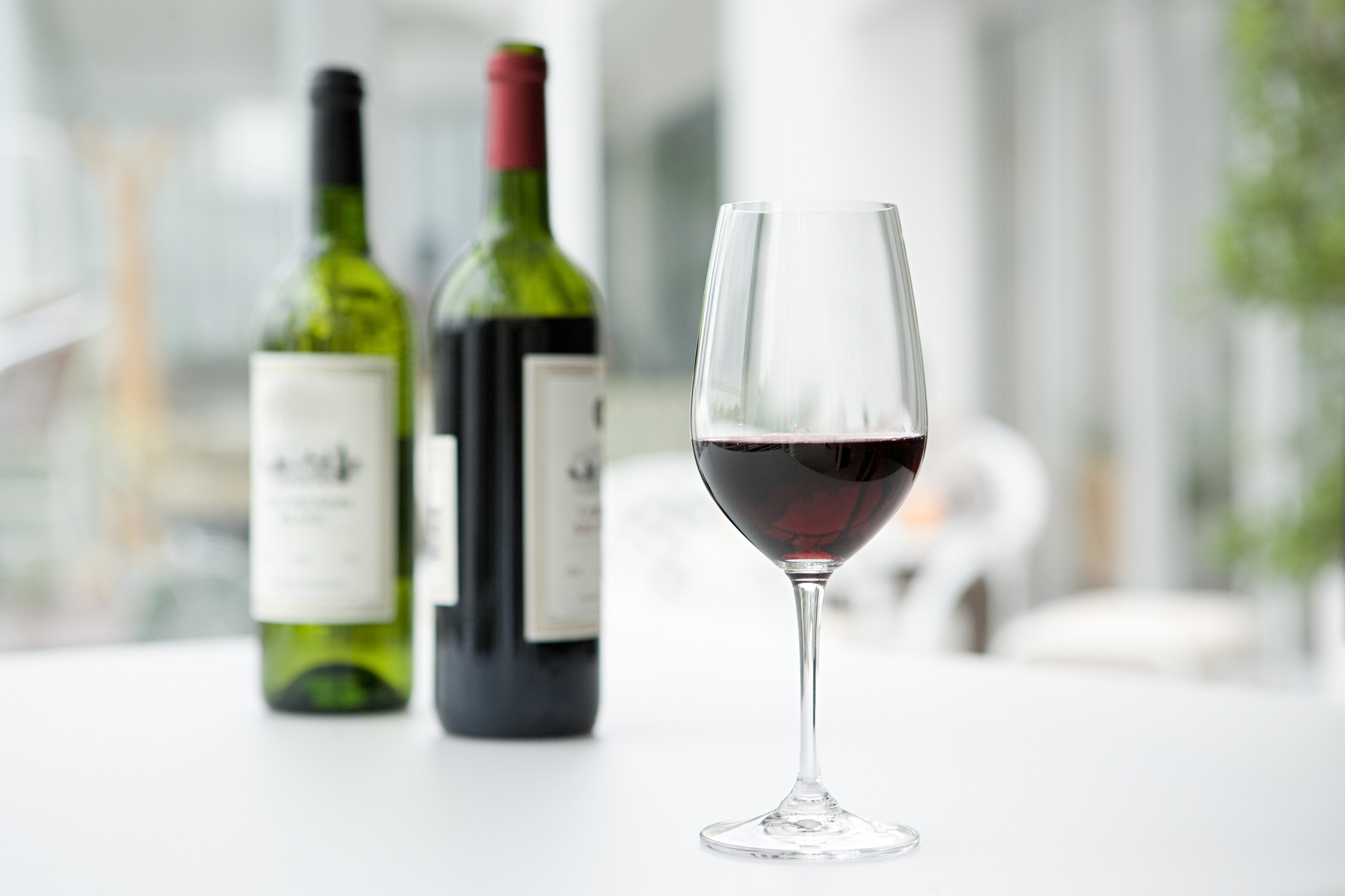 Wine bottles and glass. (Getty Images)