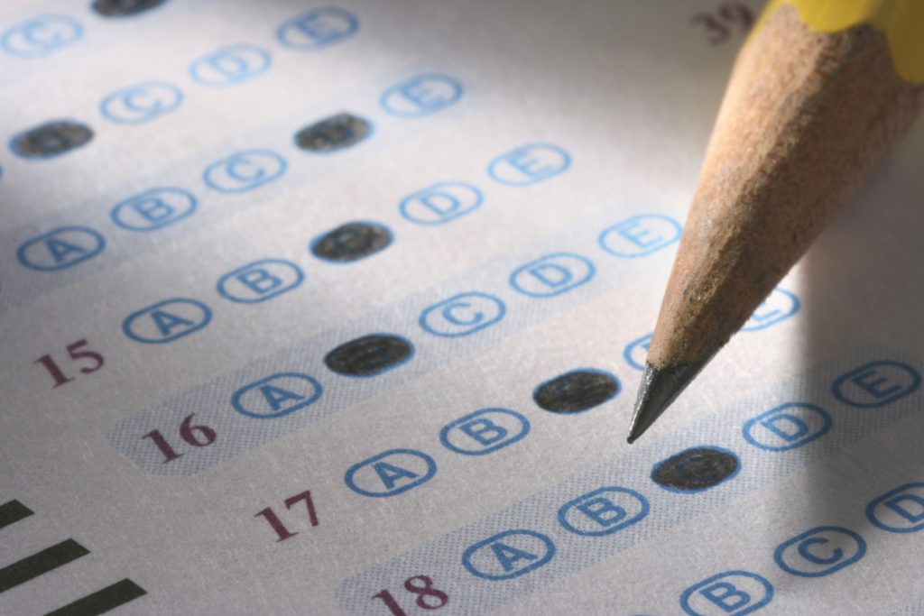 A close up of a multiple choice test with a pencil. (Getty Images)