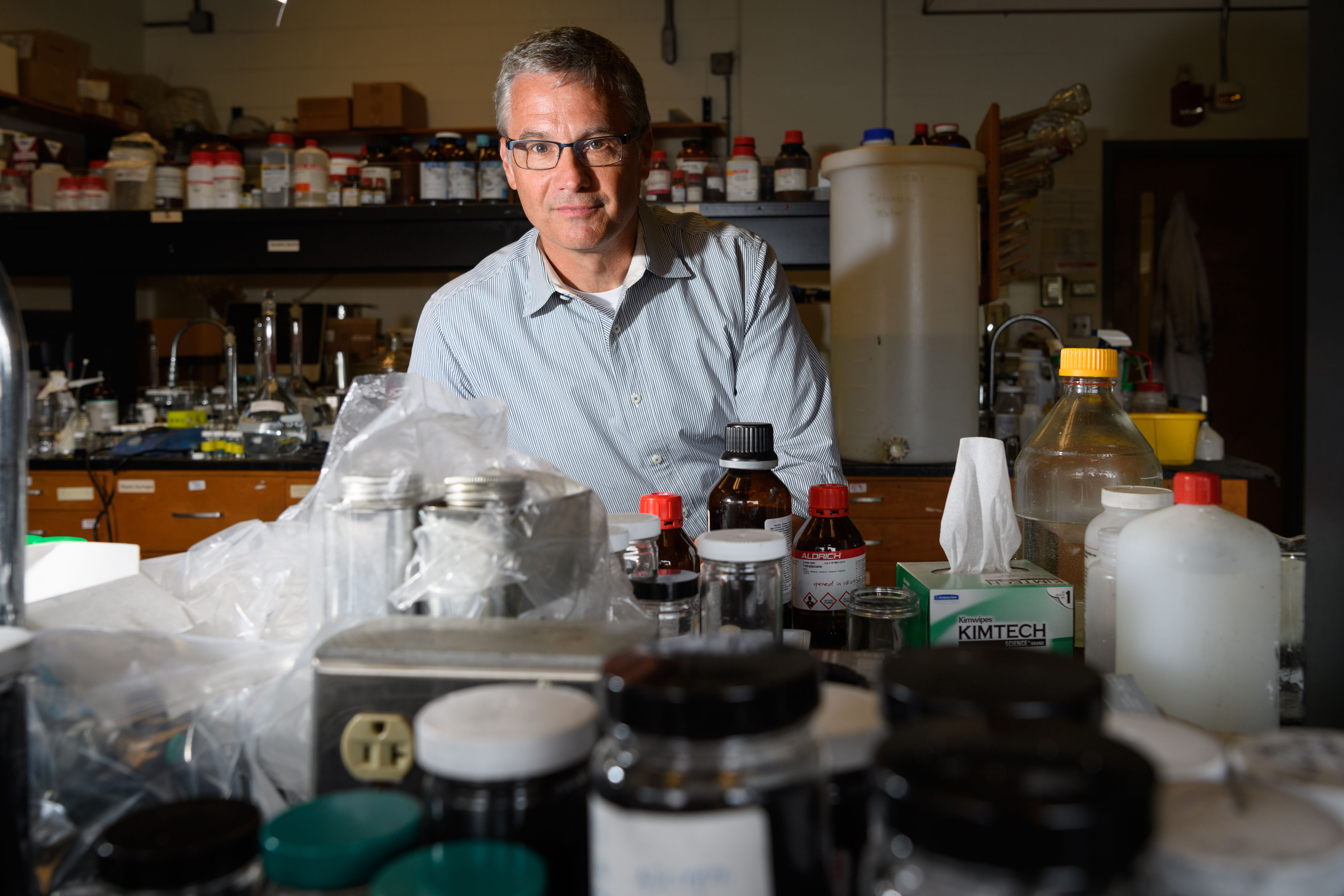 Chemistry professor Douglas Adamson, in the lab at the Institute of Materials Science on Aug. 23, 2017. (Peter Morenus/UConn Photo)